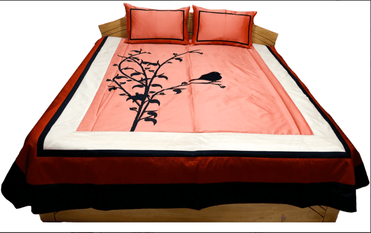 Bed cover spread on a made bed