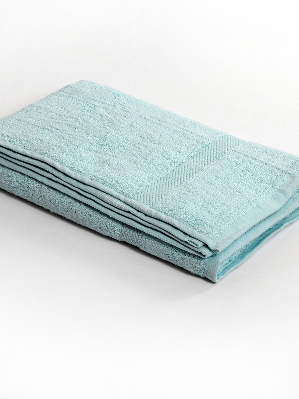 Pale sky-blue cotton bath towel folded flat with a herringbone woven border