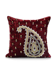 Maroon velvet cushion cover with a pearl beaded paisley motif and scattered gold beads