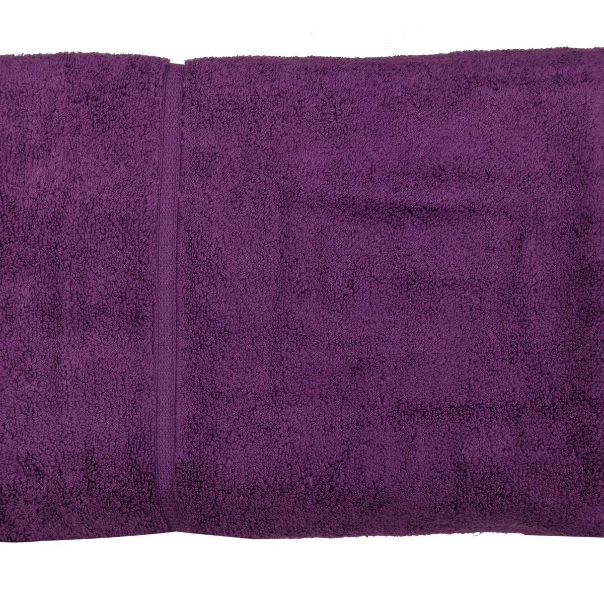 Deep purple cotton bath towel, close-up rolled view showing the woven dobby border