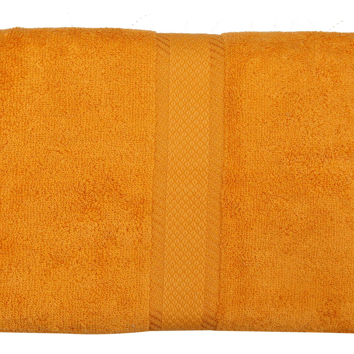 Amber-orange cotton bath towel, close-up folded view showing the diamond-weave border