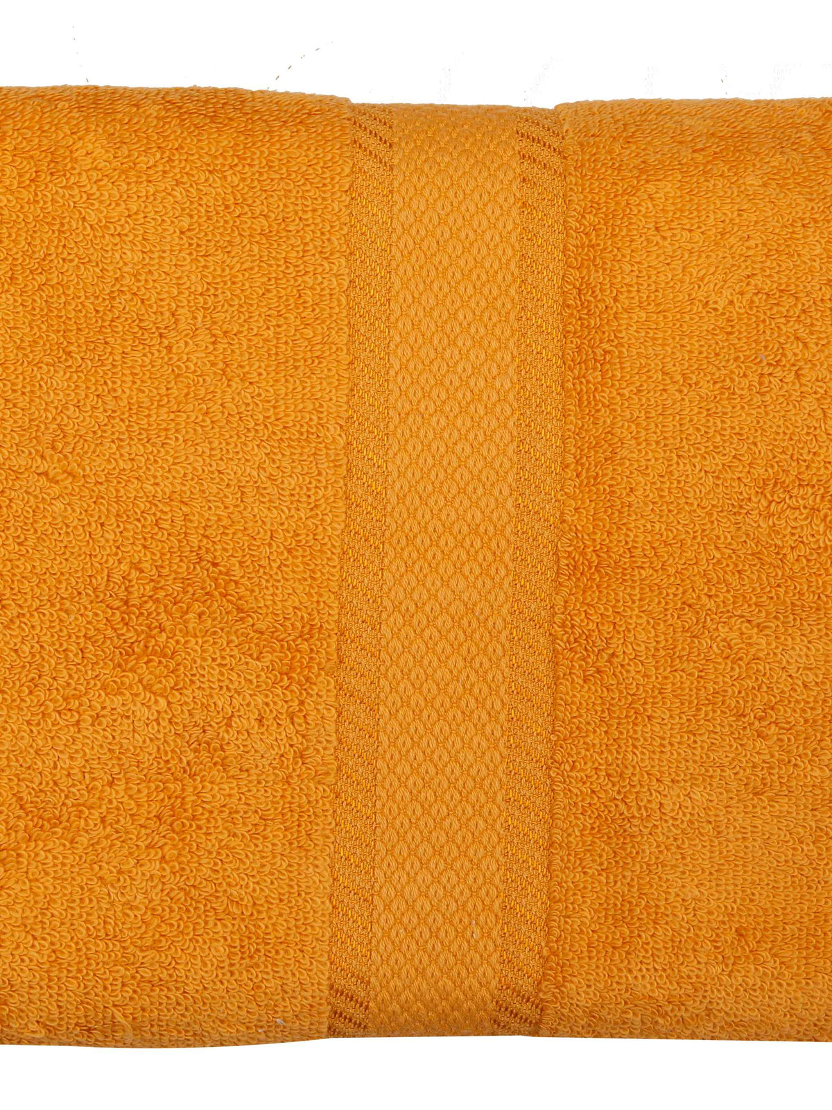 Amber-orange cotton bath towel, close-up folded view showing the diamond-weave border