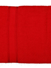 Red cotton bath towel with a woven dobby border, folded, 30x60 inch