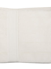 Ivory cotton bath towel with a herringbone textured border, folded, 30x60 inch