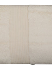 Cream cotton bath towel with a fine ribbed pleated border, folded, 30x60 inch