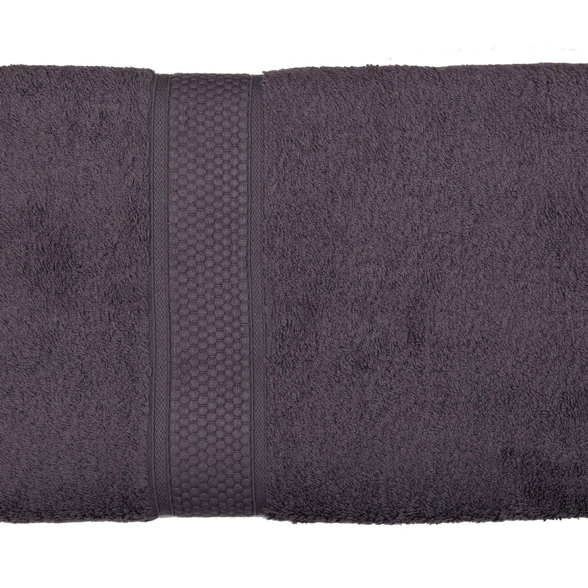 Charcoal-grey cotton bath towel, close-up rolled view showing the honeycomb woven border