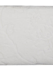 White cotton beach towel, close-up view of the textured terry fabric