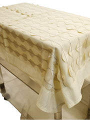 Cream table cover with a wavy ripple-appliqué stripe pattern and a scalloped hem