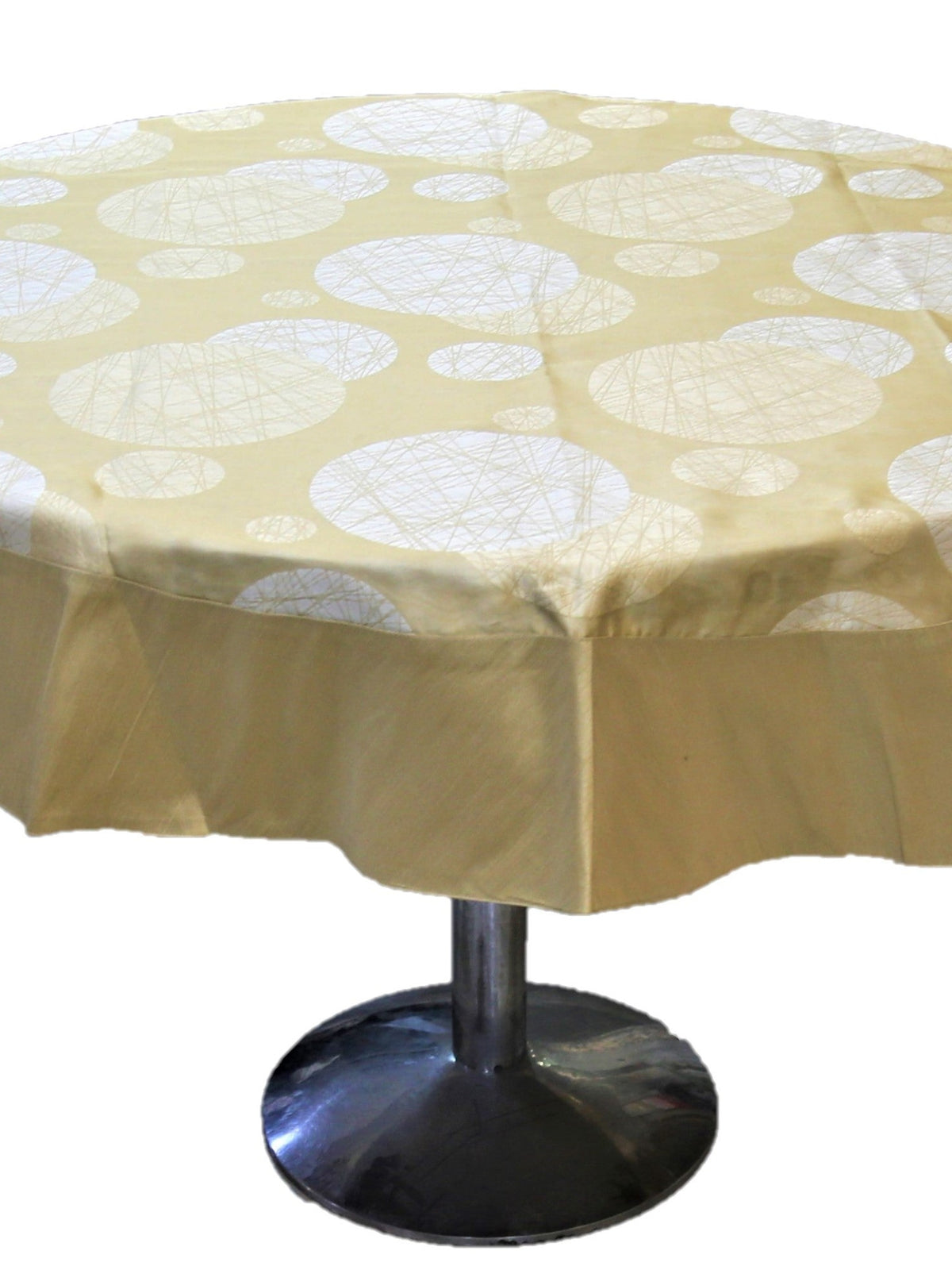 Round pale gold table cover with a white circular thread-art bubble print