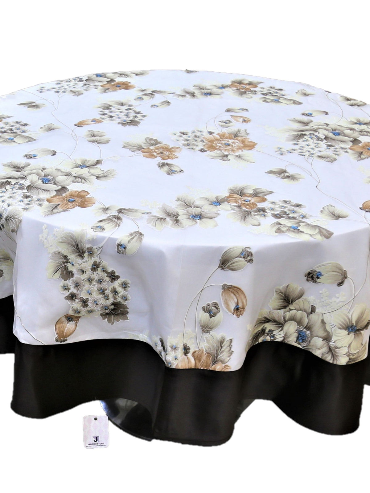Round white table cover with a printed beige-brown floral bouquet pattern and a solid black underskirt