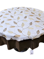Round cream table cover with a beige-gold embroidered leaf-vine pattern and a solid dark brown underskirt