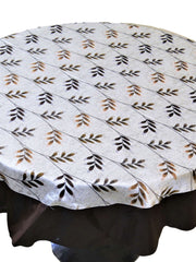Round white table cover with a beige-brown leaf-vine print and a solid dark brown underskirt