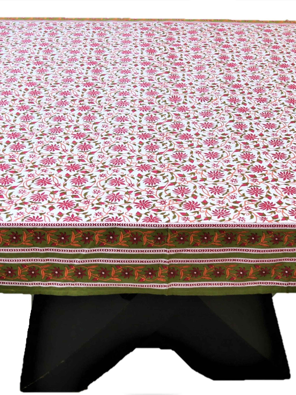 White table cover with a pink block-printed floral vine pattern and an olive-green border with a pink and maroon embroidered floral strip