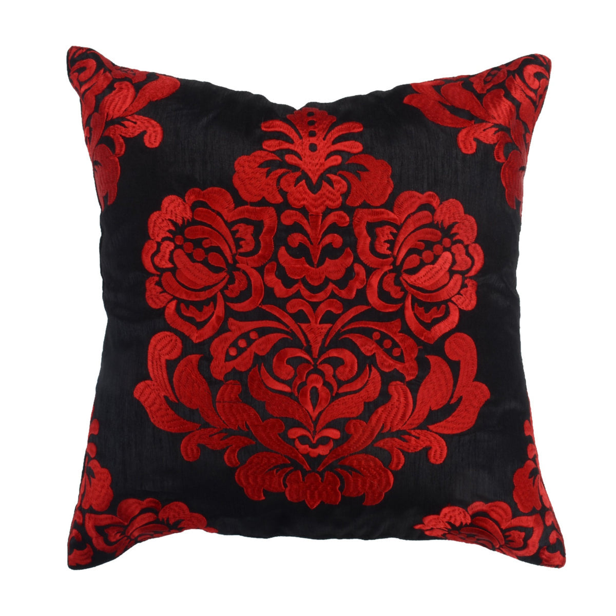 Black cushion cover with a large red flocked damask motif at the centre