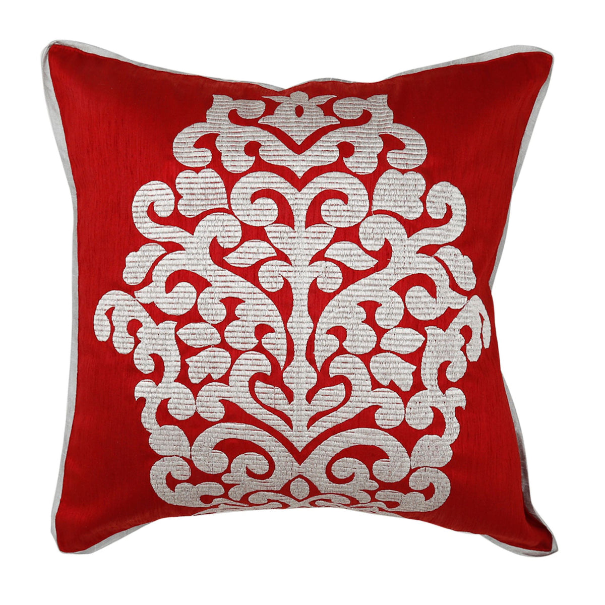 Red silk cushion cover with a large cream embroidered damask crest and white piping