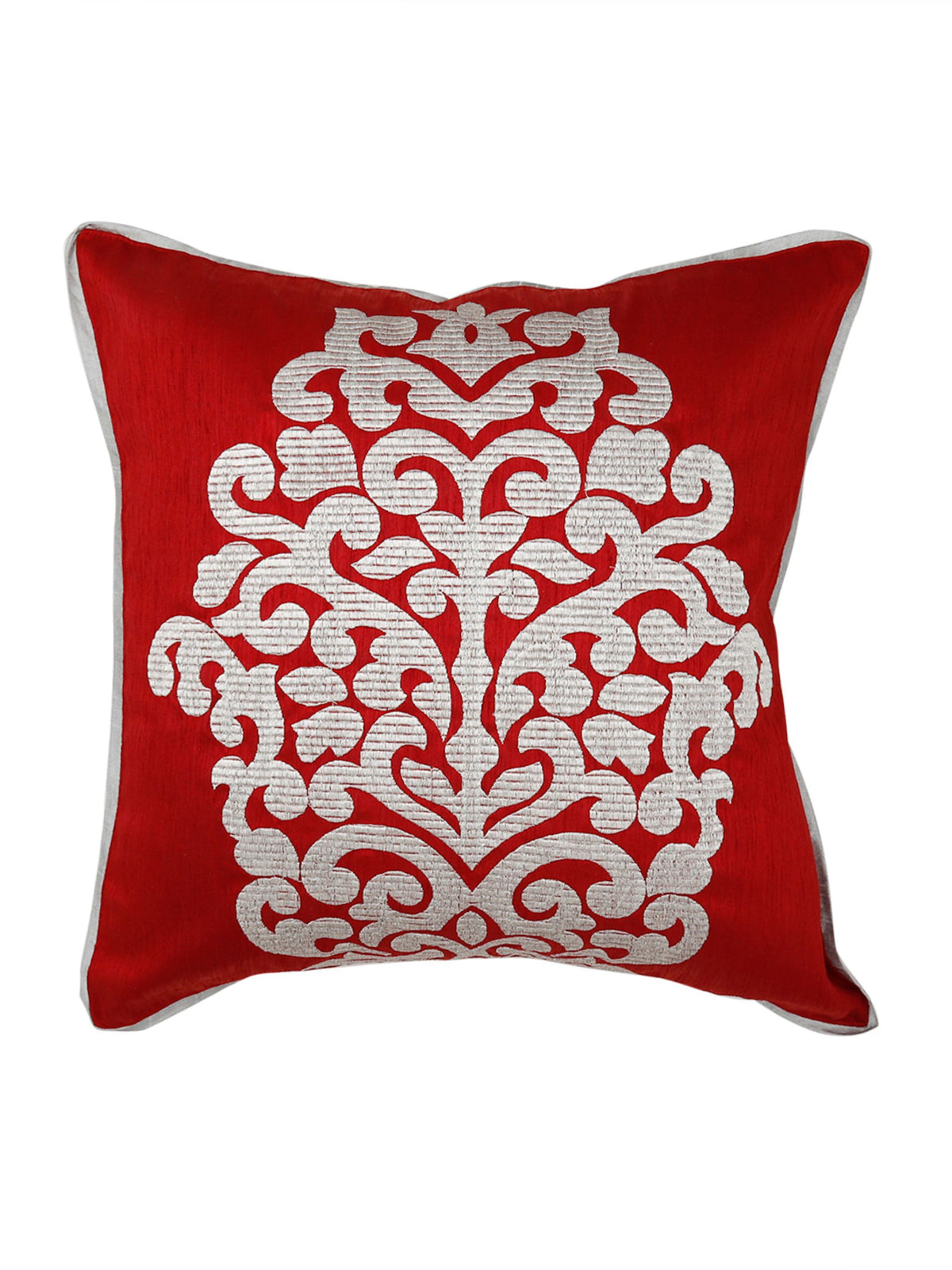 Red silk cushion cover with a large cream embroidered damask crest and white piping
