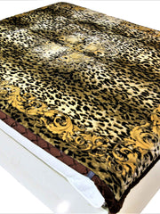 Gold-brown leopard-print blanket with a scroll medallion border