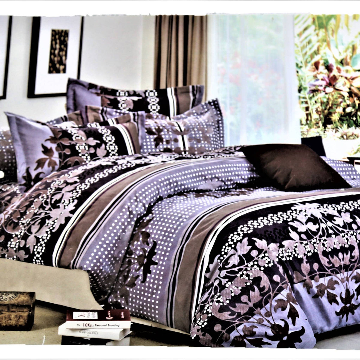 Grey, black and mauve floral and polka-dot striped print bedsheet and duvet set, styled on a bed with matching pillows