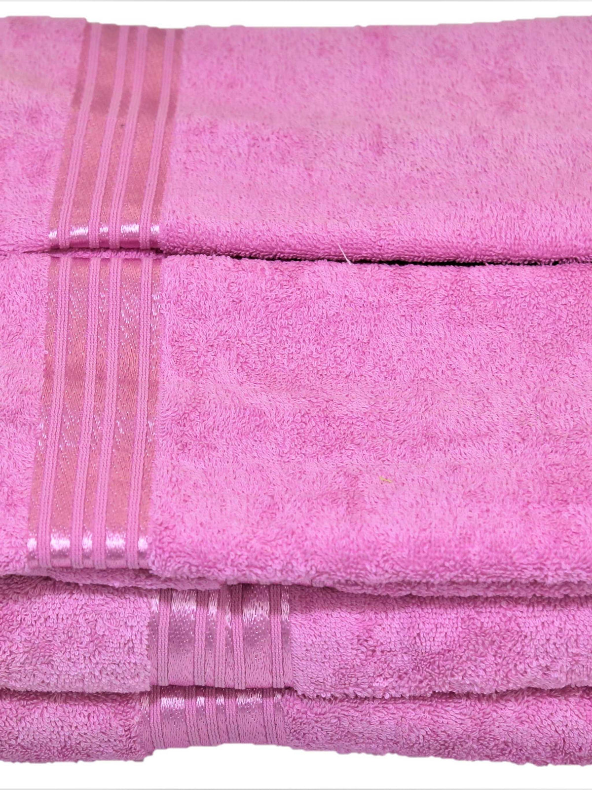 Pink cotton towel set in a plain, even colour