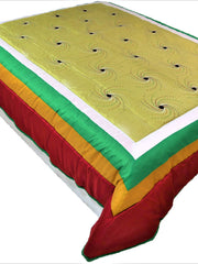 Olive-yellow polycotton double bed quilt with swirl print and red-gold-green border
