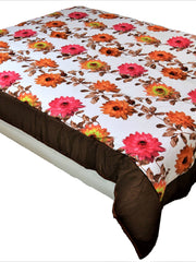 White polycotton double bed quilt with pink and orange gerbera floral print