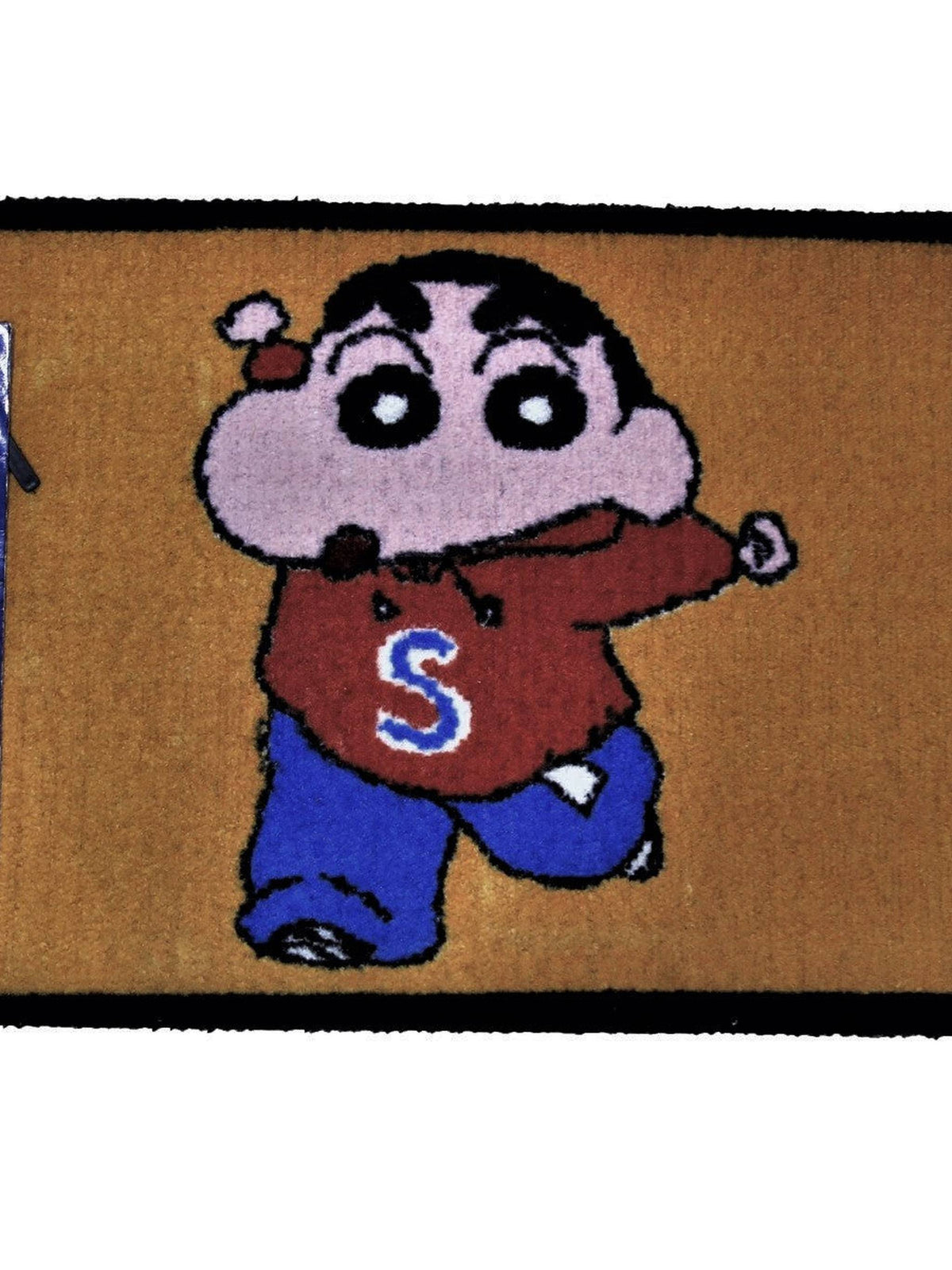 Tan kids play mat with a cartoon boy in a red cape and blue outfit with an S on the chest, 45x75 cm