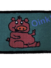 Green kids play mat with a seated cartoon pig and the word Oink in blue, 40x60 cm