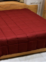 Maroon microfibre double bed quilt with satin self-stripe, Bombay Dyeing