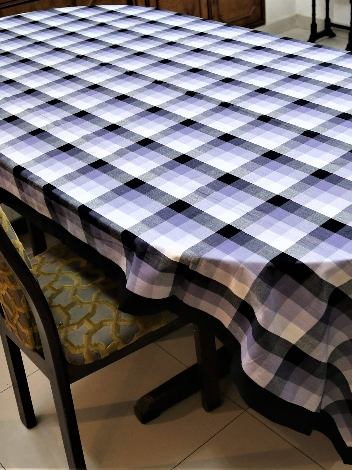 White, lavender, and black buffalo-check plaid oval table cover