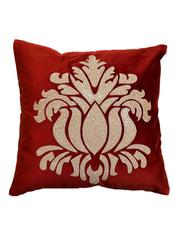 Red velvet cushion cover with a large cream damask crest appliqué at the centre