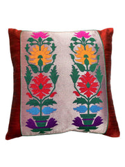 Red dupion silk cushion cover with a silver brocade panel of multicoloured flowering vines