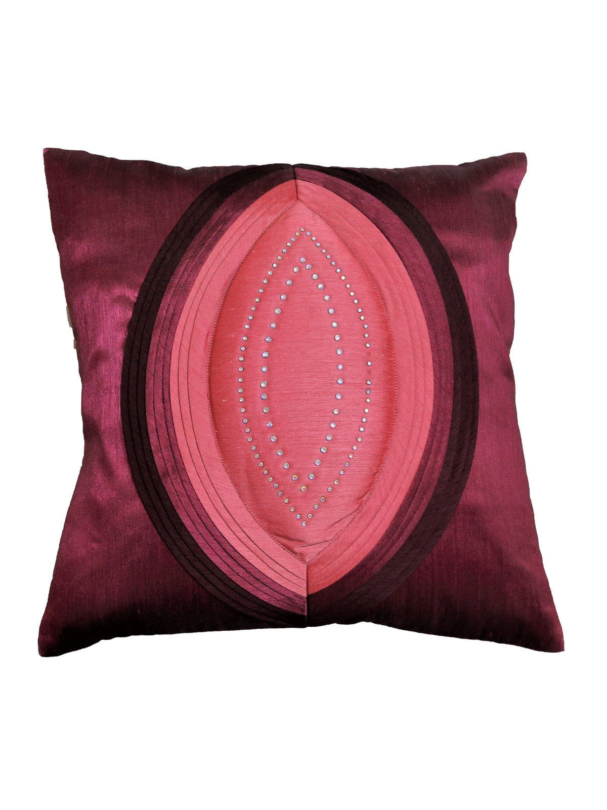 Plum poly silk cushion cover with a coral pink leaf shaped appliqué outlined in silver stones