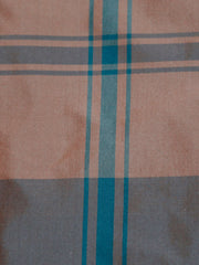 Cinnipatta silk upholstery fabric in a dusty peach and slate blue check with teal stripe lines