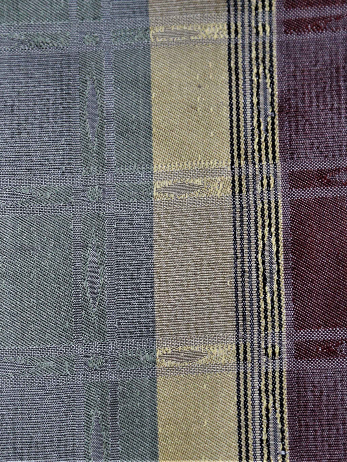Dupion jacquard silk fabric in vertical slate-blue, gold, black, and maroon colour-block stripes
