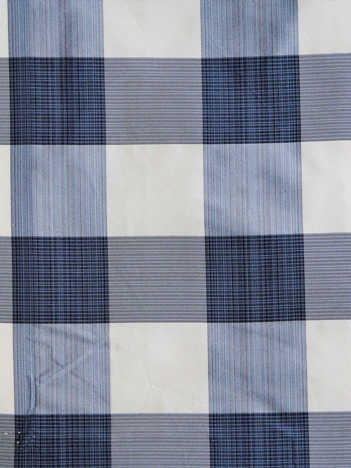 Taffeta silk upholstery fabric in a large navy blue and cream buffalo check