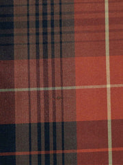 Rust-orange and black polysilk upholstery fabric in a windowpane check