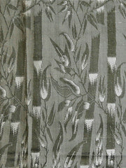 Sage-green silk upholstery fabric with an olive-green leaf-vine brocade
