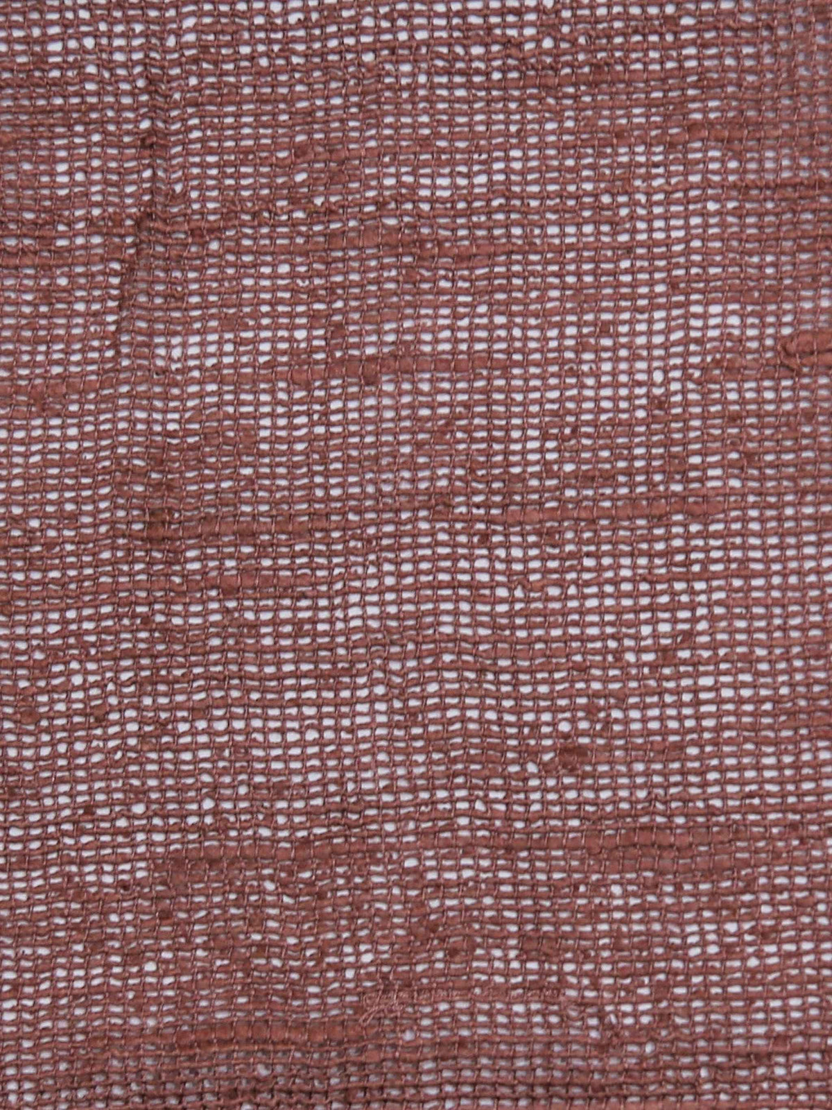 Dusty rose silk upholstery fabric in an open sheer weave