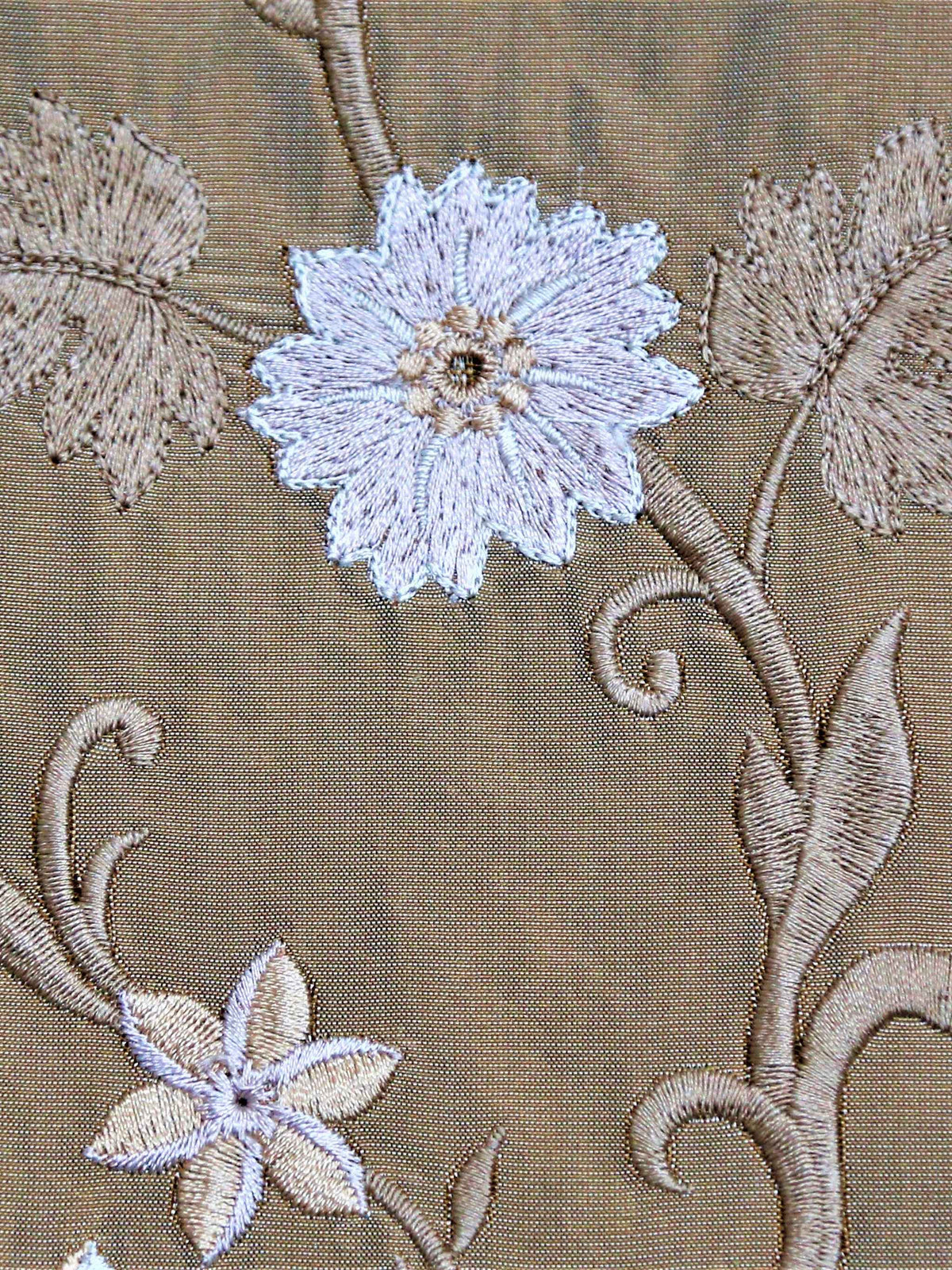 Bronze-brown silk upholstery fabric with a white embroidered floral vine