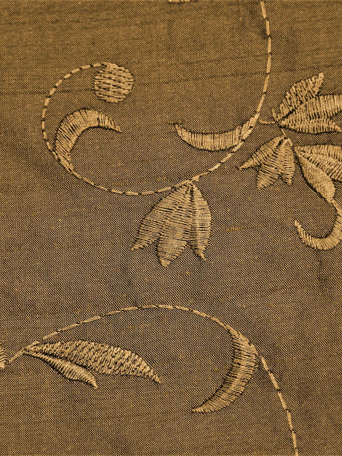 Rust-beige silk upholstery fabric with a tone-on-tone embroidered floral vine