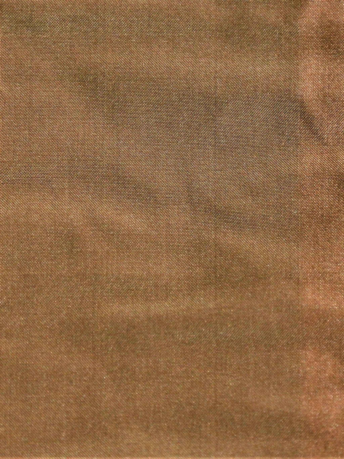 Secta plain silk upholstery fabric in copper rust with a soft shot sheen