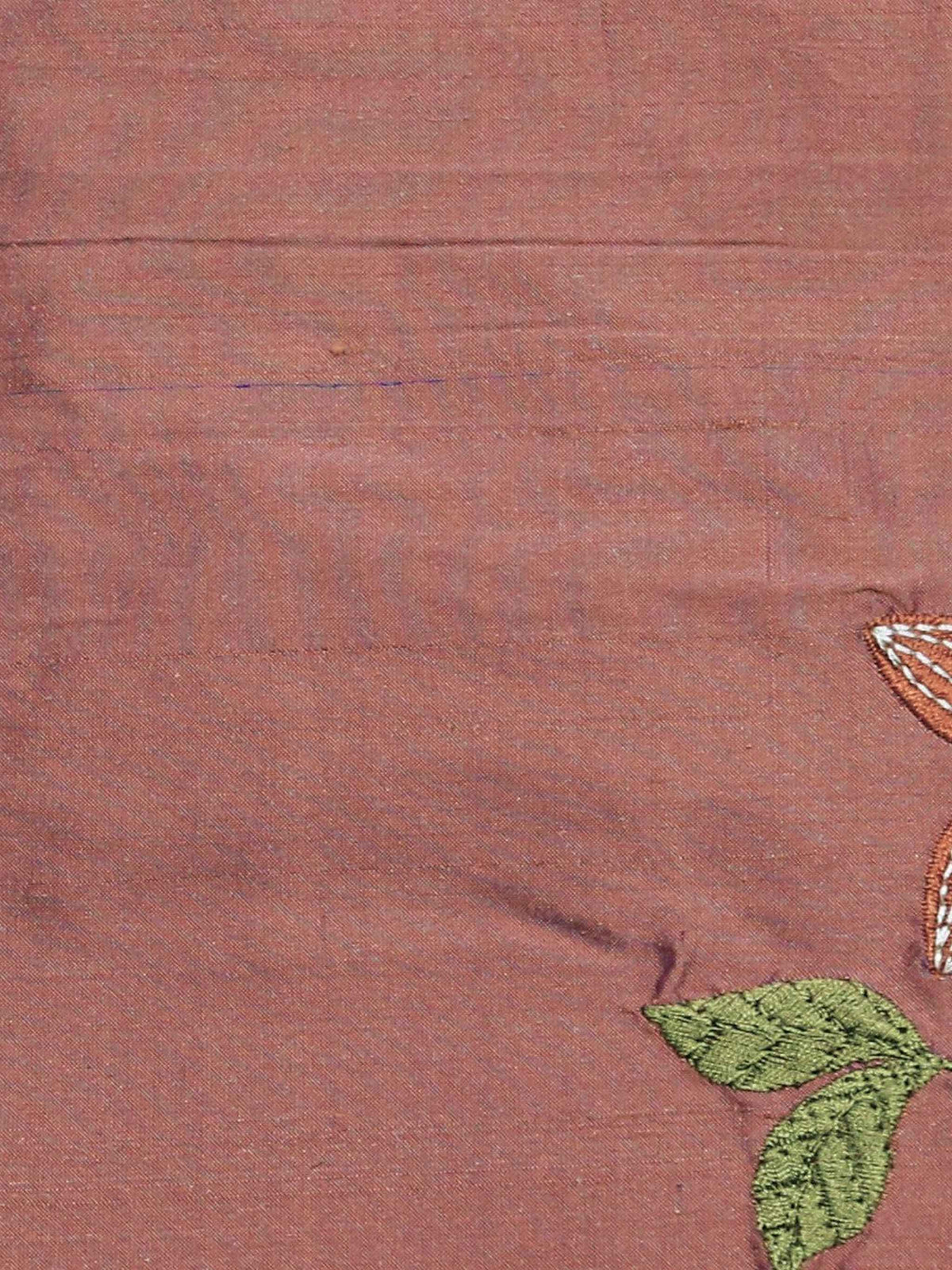 Dusty rose silk upholstery fabric with scattered tone-on-tone leaf and flower embroidery