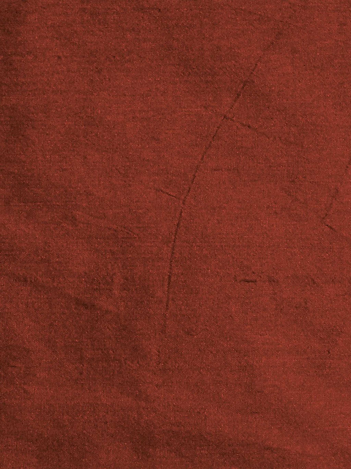 Sanchi plain silk upholstery fabric in deep rust with a matte woven surface