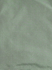 Pista green silk upholstery fabric in a plain, even colour