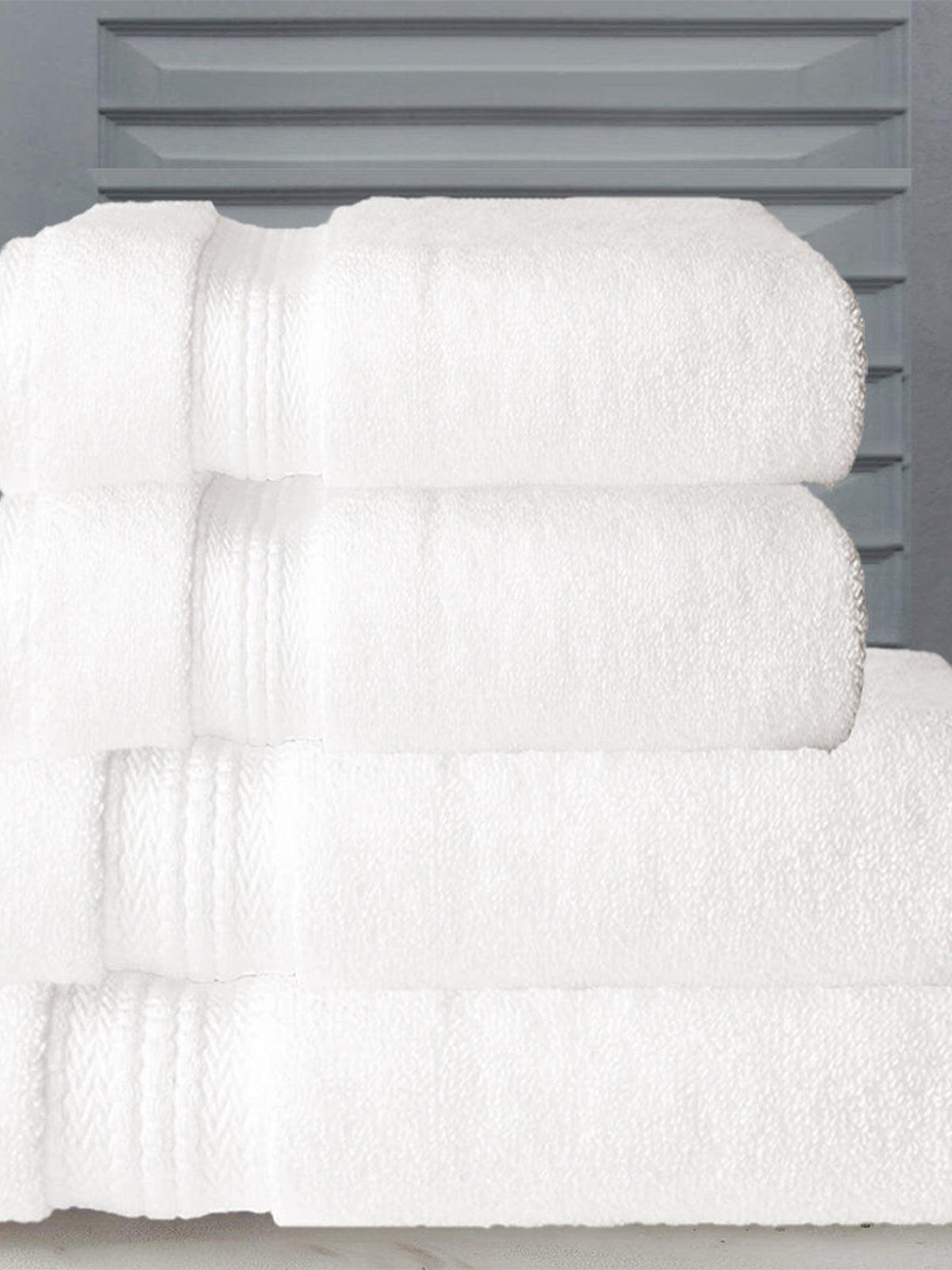 White cotton towel set in a plain, even colour