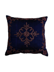 Navy blue cushion cover with a copper-bronze zari-embroidered scroll medallion and matching border
