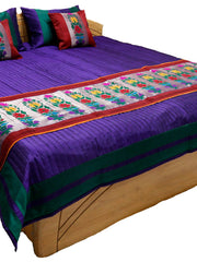Purple satin-stripe reversible bedcover with a multicolour floral-embroidered runner and matching cushions