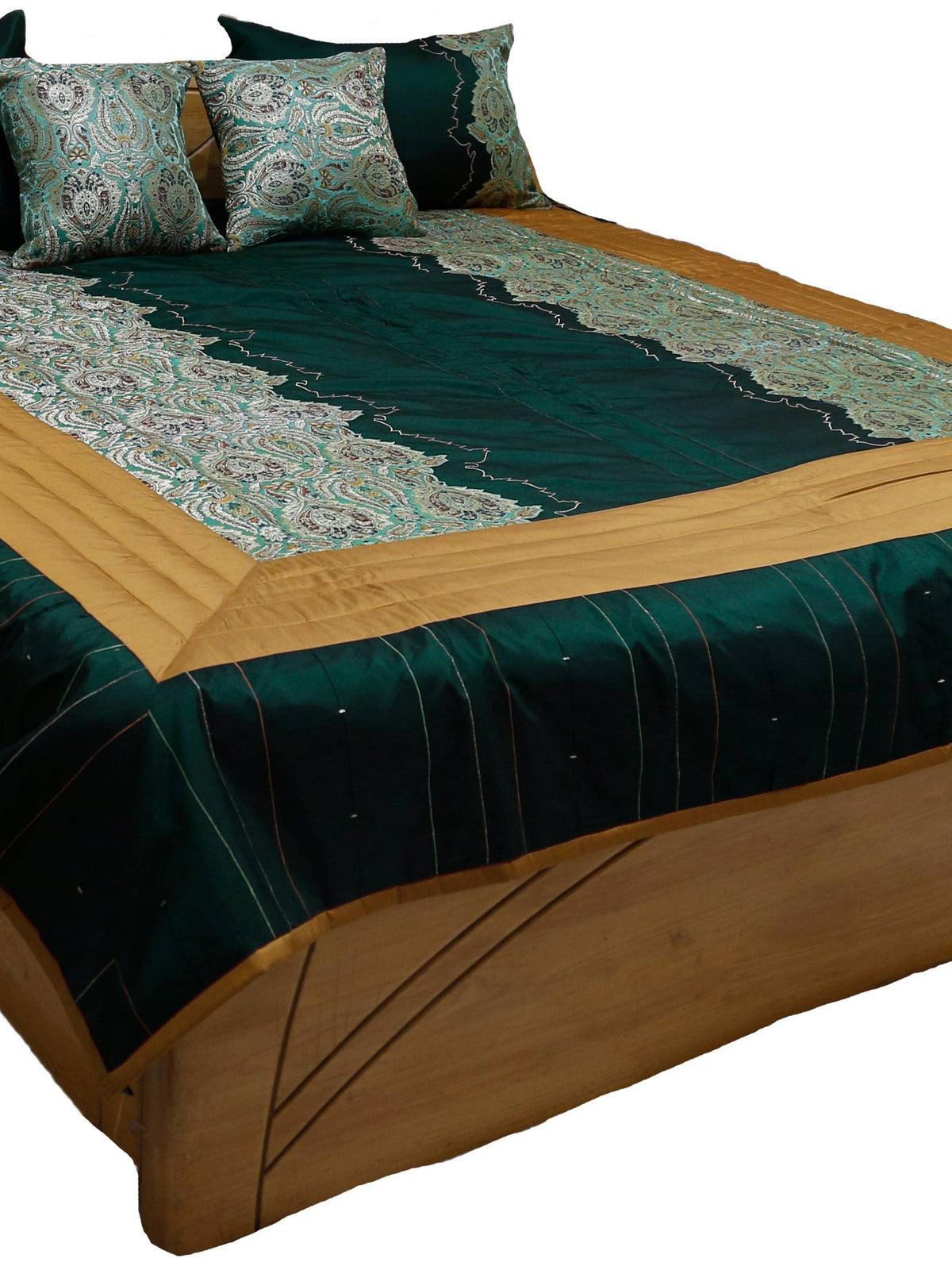 Deep teal silk bedcover with turquoise paisley brocade panels and gold quilted border