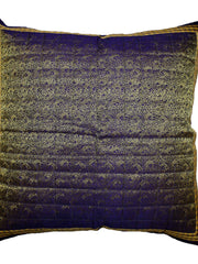 Deep navy-blue cushion cover with a gold paisley brocade pattern and a checked border