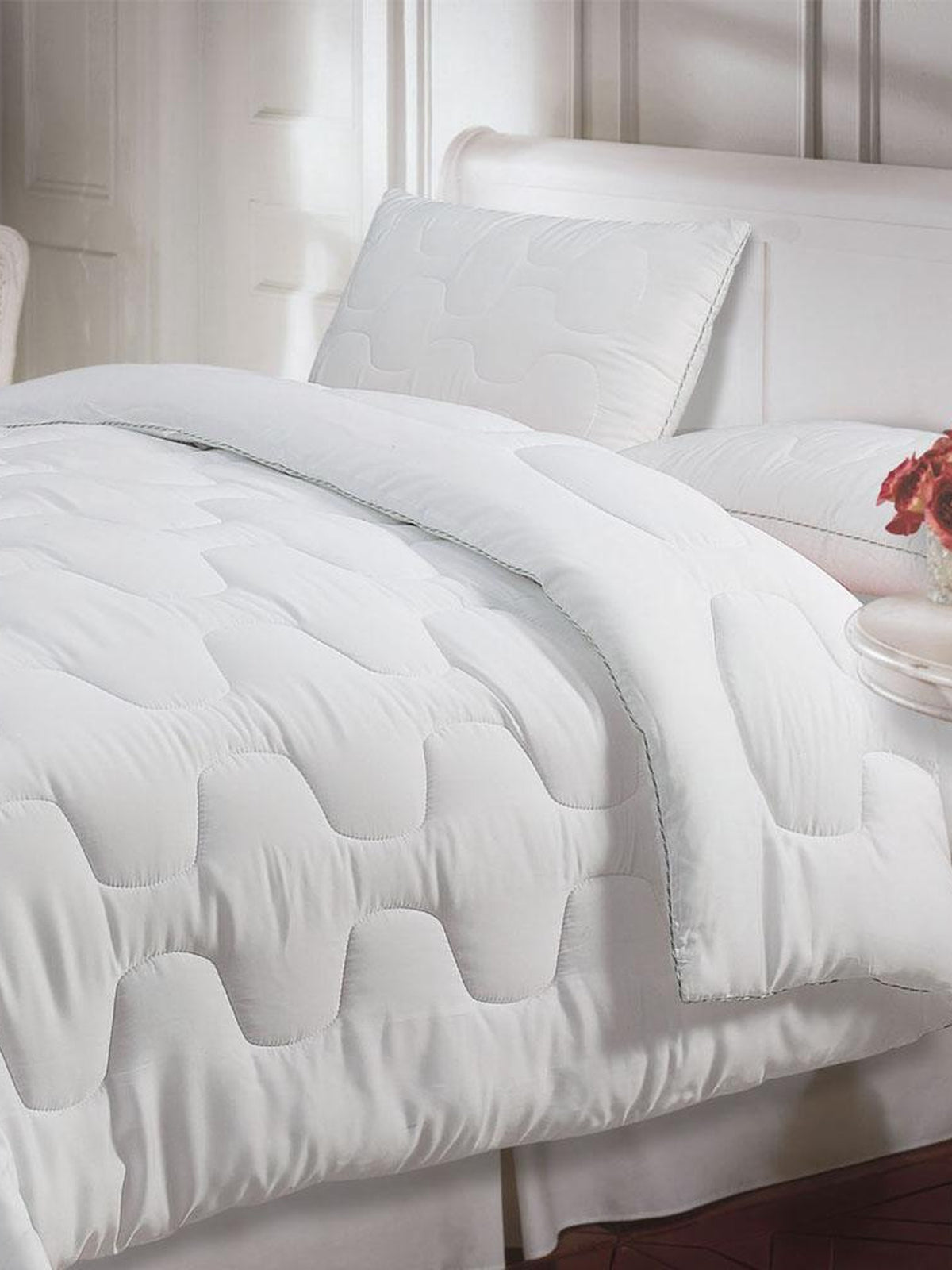 White tencel single bed quilt with honeycomb quilting texture